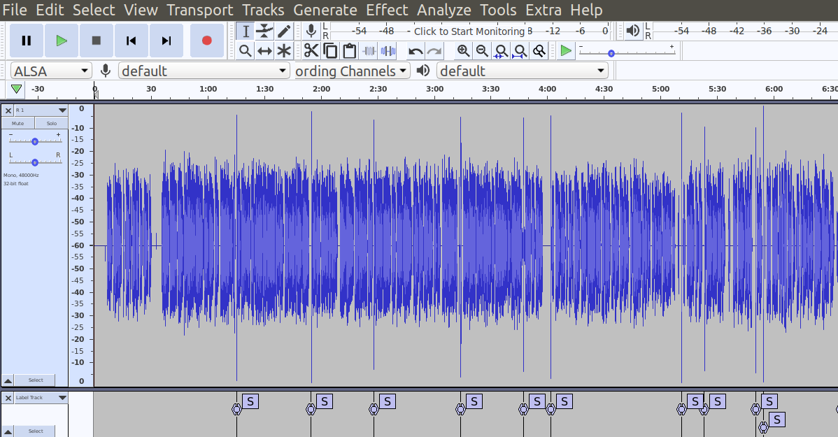 Audio waveform in audacity with decibel scale and label track that labels the audio spikes